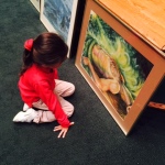 kid looking at adam painting
